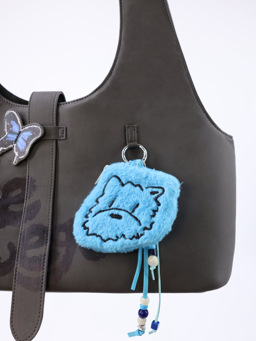 The Plush Poop Bag Holder